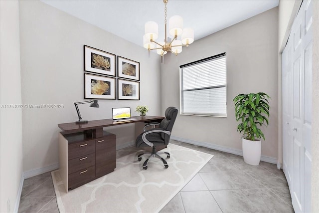 office area with a chandelier, light tile patterned flooring, and baseboards