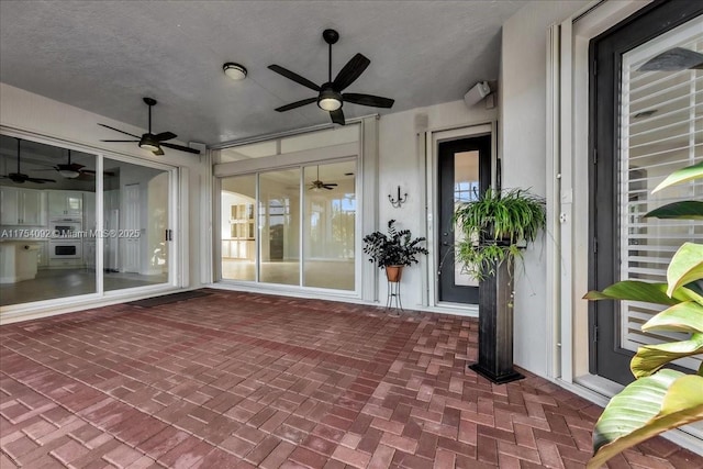 view of patio / terrace with a ceiling fan