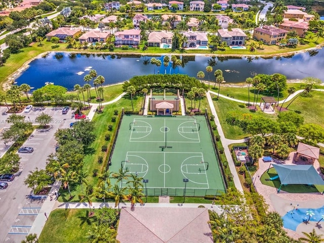 aerial view with a water view and a residential view