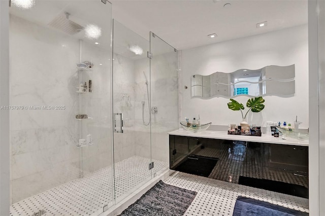 bathroom featuring tile patterned flooring, a shower stall, vanity, and recessed lighting