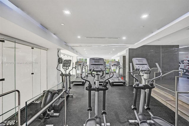 gym with recessed lighting