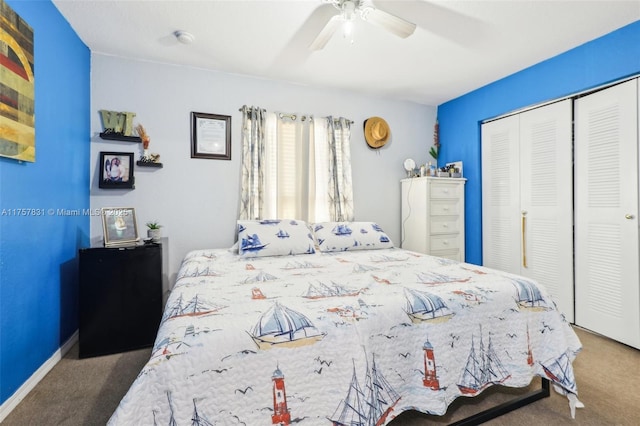 bedroom featuring ceiling fan, a closet, carpet flooring, and baseboards