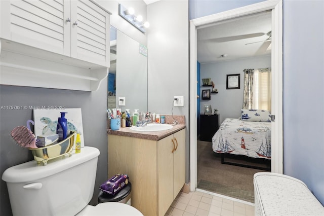 bathroom featuring ensuite bathroom, vanity, toilet, and a ceiling fan