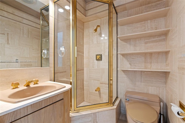 full bathroom featuring tile walls, a shower stall, toilet, and vanity