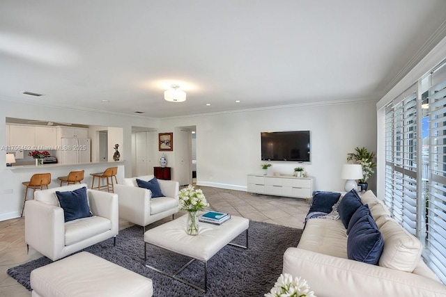 tiled living room featuring ornamental molding, recessed lighting, visible vents, and baseboards