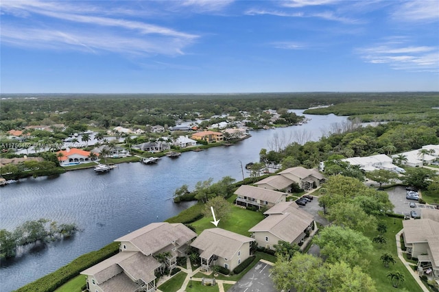 aerial view with a residential view and a water view