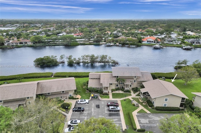 aerial view featuring a water view and a residential view