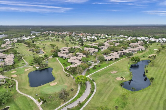 bird's eye view with a water view, view of golf course, and a residential view