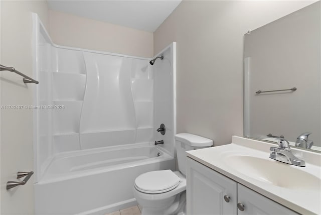 bathroom with tub / shower combination, vanity, toilet, and tile patterned floors