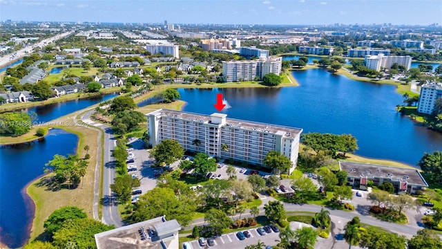 aerial view featuring a water view and a city view