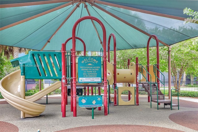 community play area featuring fence