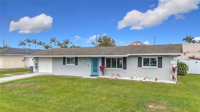 single story home with concrete driveway, a front lawn, fence, and stucco siding