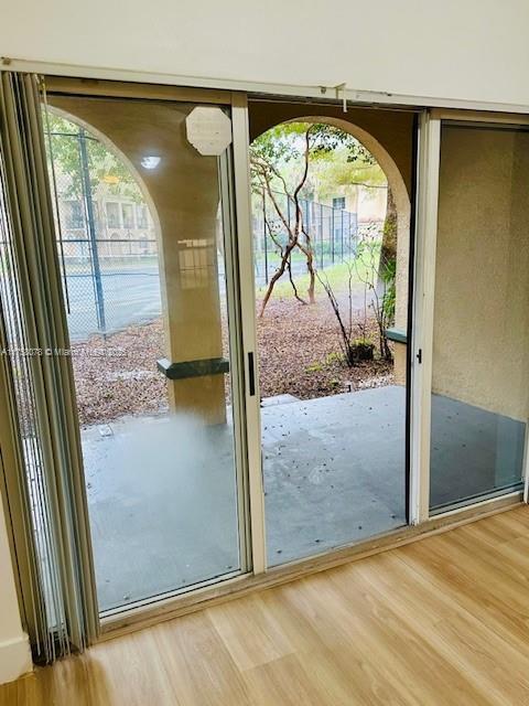 entryway with light wood-style flooring