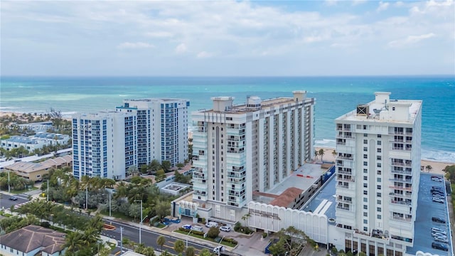 aerial view with a water view and a view of city