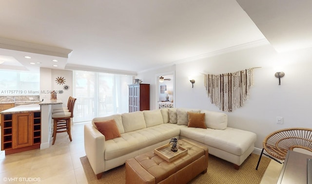 living room featuring a wall of windows, recessed lighting, light tile patterned flooring, and crown molding