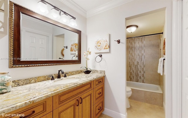 full bath featuring toilet, ornamental molding, tub / shower combination, vanity, and baseboards