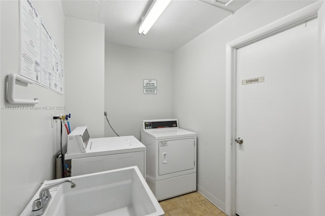 1236 Hillsboro Mile Unit 403, Hillsboro Beach, FL 33062 - clothes washing area featuring washer and dryer and a sink