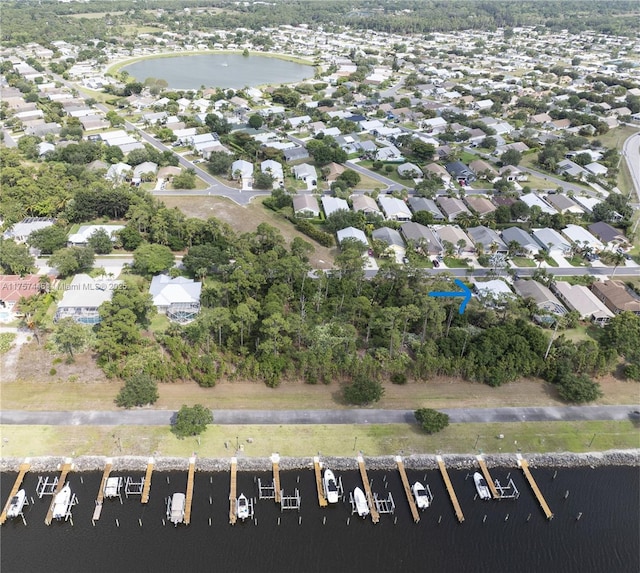 8904 SW Fishermans Wharf Dr, Stuart, FL 34997 - view of property location featuring a nearby body of water and nearby suburban area
