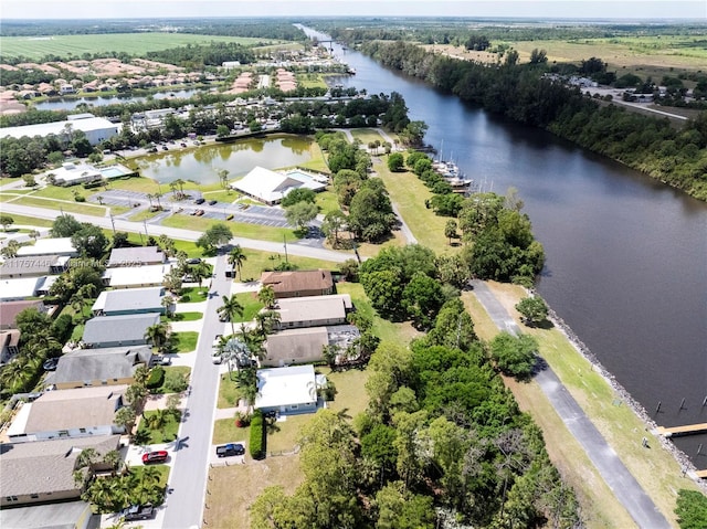 8904 SW Fishermans Wharf Dr, Stuart, FL 34997 - aerial view of residential area featuring a nearby body of water