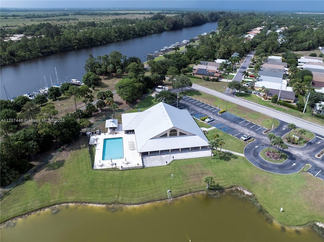 bird's eye view with a water view