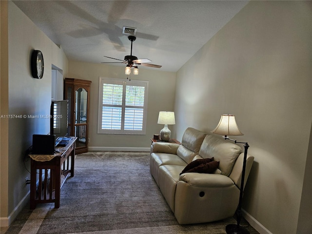 8904 SW Fishermans Wharf Dr, Stuart, FL 34997 - carpeted living room with baseboards and ceiling fan