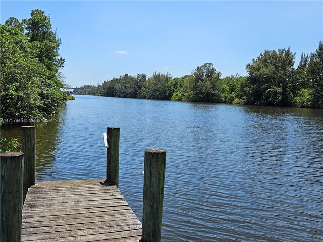8904 SW Fishermans Wharf Dr, Stuart, FL 34997 - dock area featuring a water view