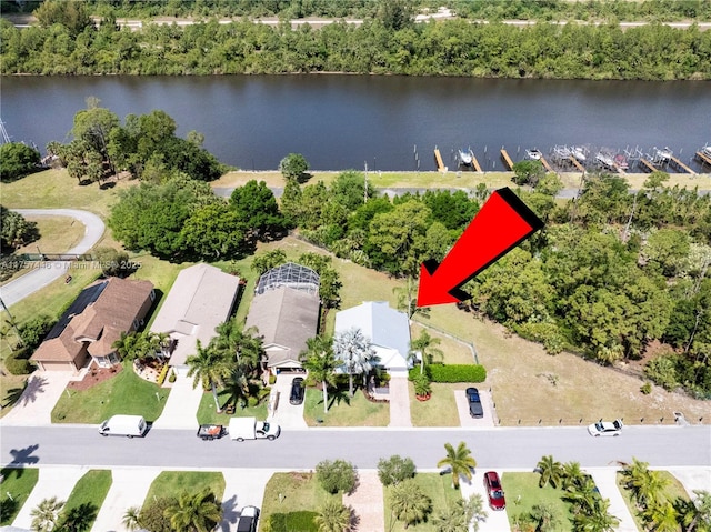 8904 SW Fishermans Wharf Dr, Stuart, FL 34997 - aerial view of residential area featuring a large body of water