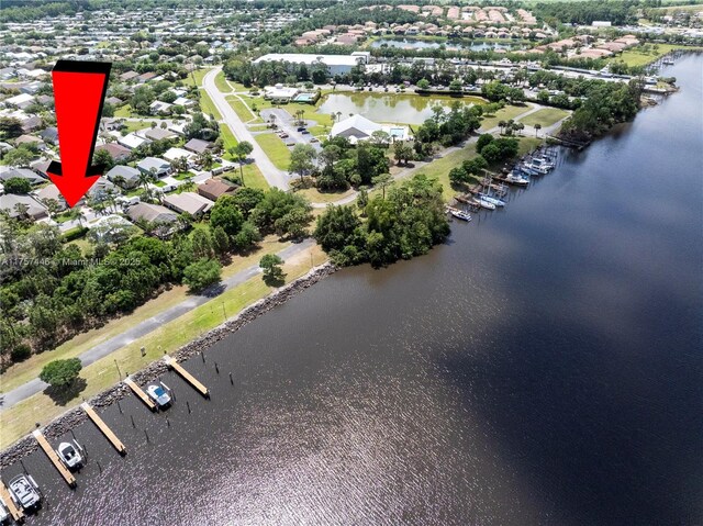 8904 SW Fishermans Wharf Dr, Stuart, FL 34997 - bird's eye view of a nearby body of water