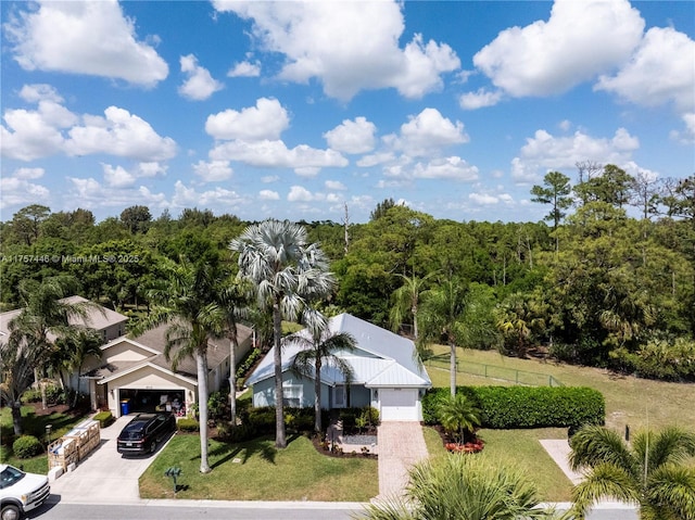 8904 SW Fishermans Wharf Dr, Stuart, FL 34997 - aerial view of property and surrounding area with a heavily wooded area