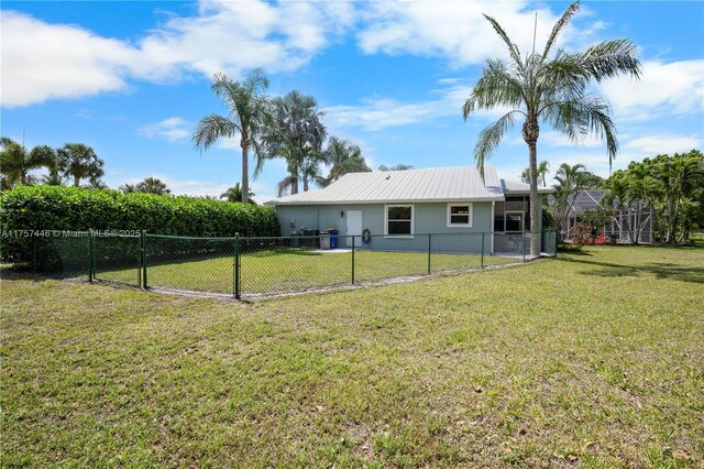 8904 SW Fishermans Wharf Dr, Stuart, FL 34997 - back of property featuring metal roof