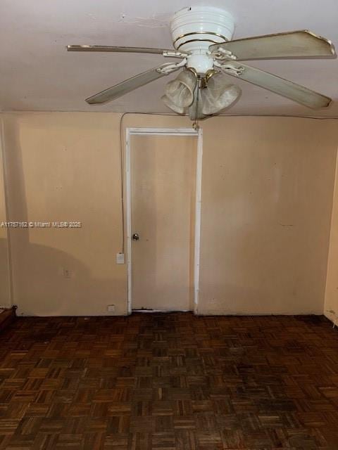 unfurnished room with a ceiling fan