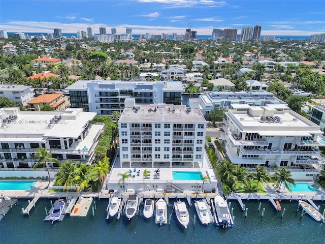 bird's eye view with a view of city and a water view