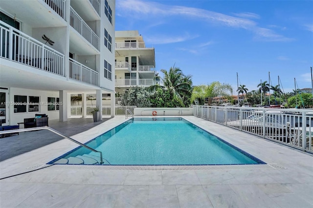 pool with a patio area