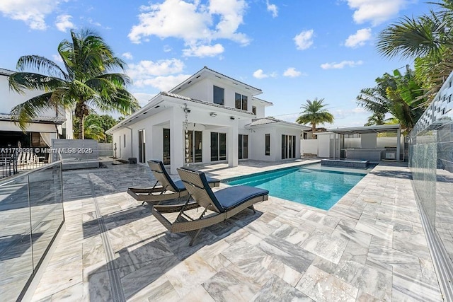 view of pool featuring a patio area, fence, and a fenced in pool