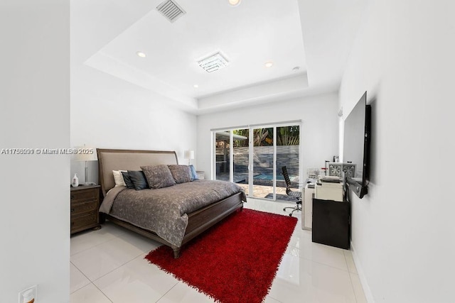 bedroom featuring light tile patterned floors, visible vents, access to exterior, a tray ceiling, and recessed lighting