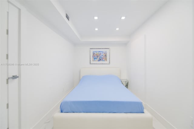 bedroom with visible vents and recessed lighting