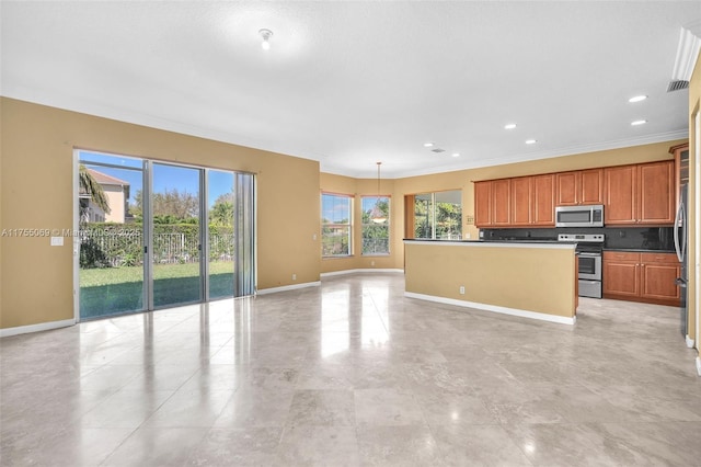 kitchen featuring baseboards, brown cabinetry, ornamental molding, a kitchen island with sink, and stainless steel appliances