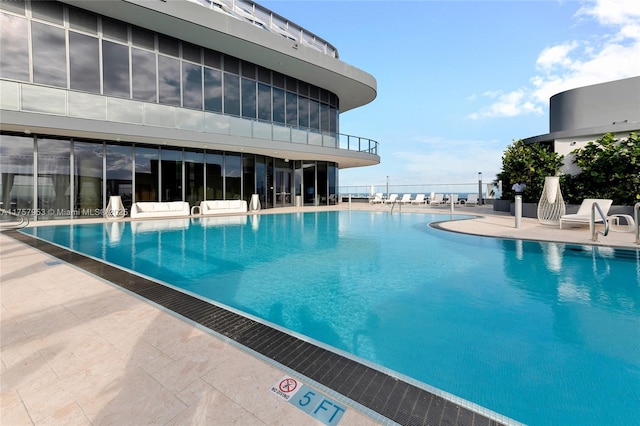 community pool featuring a patio