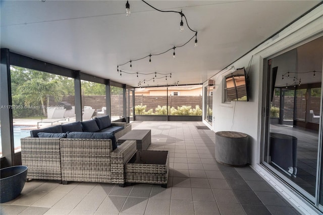 view of patio / terrace with fence and an outdoor living space