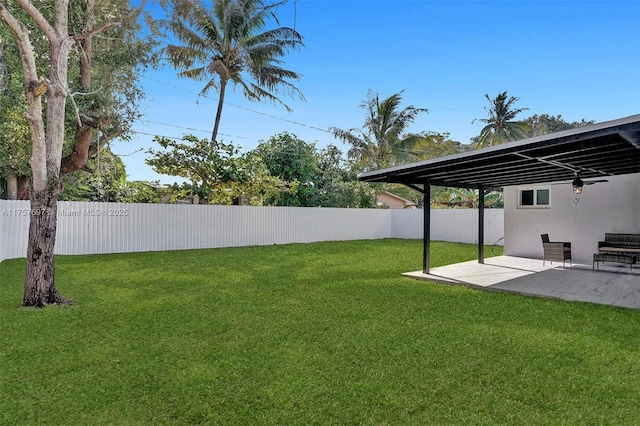 view of yard featuring a fenced backyard and a patio