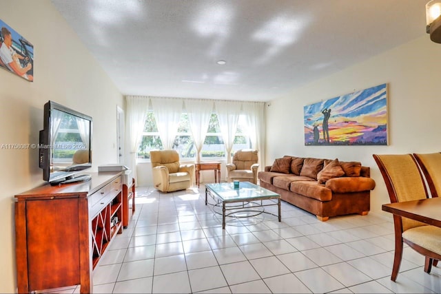 living area with light tile patterned floors