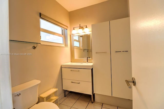 850 NE 12th Ave Unit 210, Hallandale Beach, FL 33009 - bathroom featuring toilet, tile patterned floors, and vanity