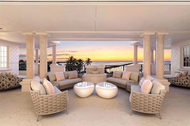 patio terrace at dusk with outdoor lounge area