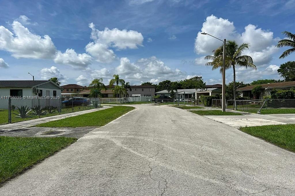 view of road with street lighting and a residential view