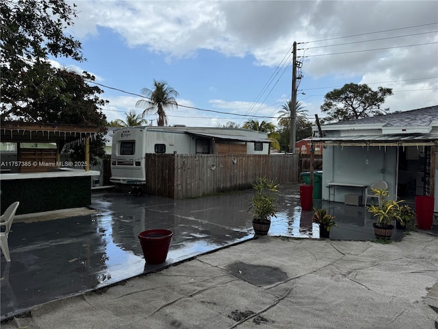 view of patio with fence