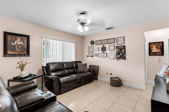 6830 SW 5th Ter, Miami, FL 33144 - living area with light tile patterned floors, visible vents, baseboards, and a ceiling fan