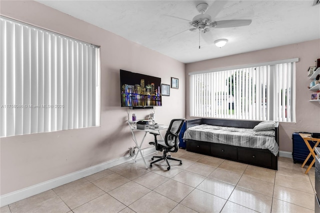 6830 SW 5th Ter, Miami, FL 33144 - bedroom with tile patterned flooring, ceiling fan, and baseboards