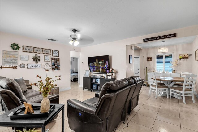 6830 SW 5th Ter, Miami, FL 33144 - living area featuring light tile patterned flooring, visible vents, and ceiling fan