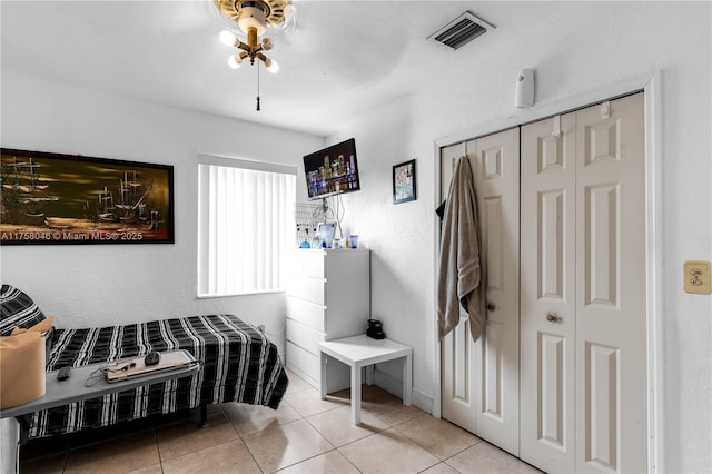 6830 SW 5th Ter, Miami, FL 33144 - tiled bedroom featuring visible vents and a closet