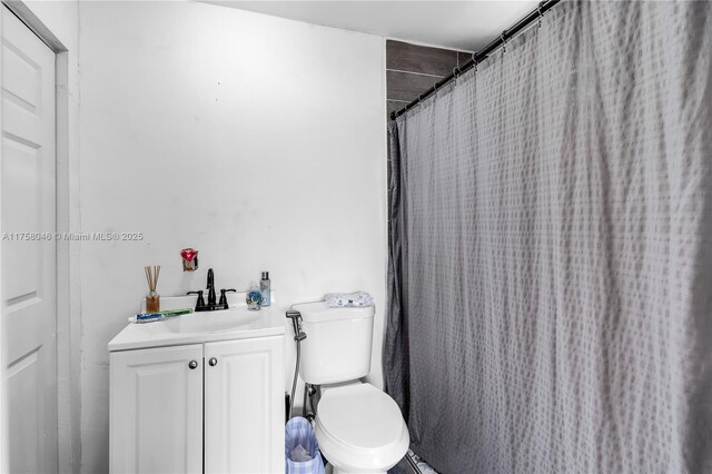 6830 SW 5th Ter, Miami, FL 33144 - bathroom with vanity, curtained shower, and toilet